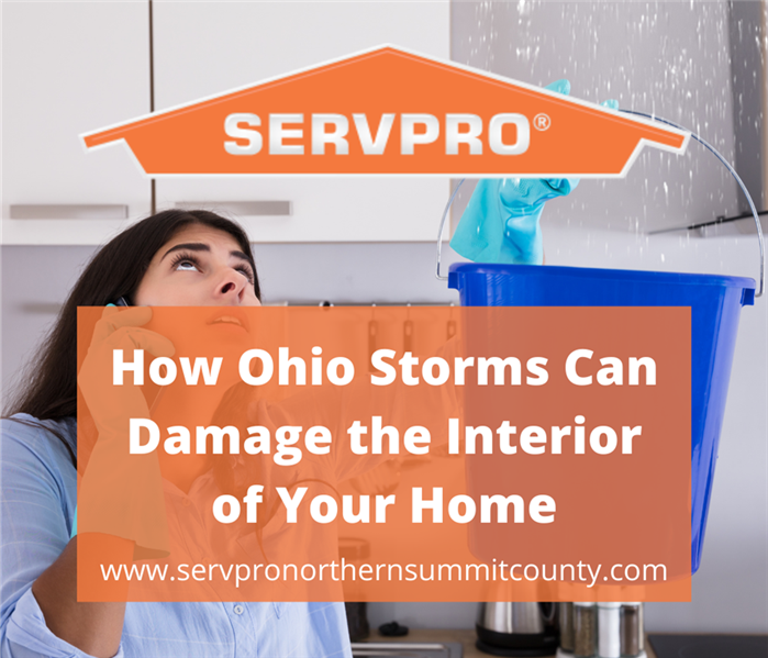 A woman holding a bucket to catch the water dripping from her ceiling. How Ohio Storms Can Damage the Interior of Your Home -